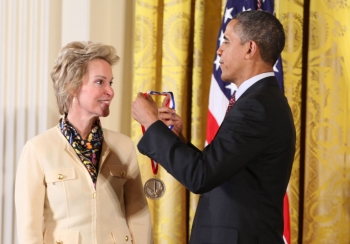 President Barack Obama presents Dr. Frances H. Arnold (left), California Institute of Technology, the Medal of Technology and Innovation for her pioneering biofuels-related research that could eventually lead to the replacement of pollutant-causing material. 