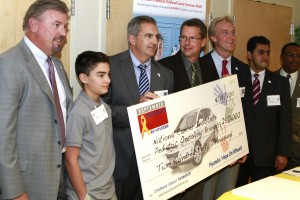 Orentas receiving research grant award from local Hyundai dealers