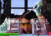 Photo of researcher conducting a lab experiment