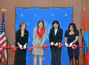 The ribbon cutting ceremony at the Program room opening.