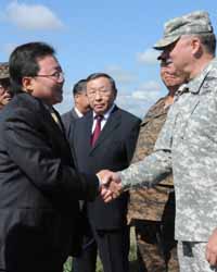 Mongolian President Ts. Elbegdorj shakes hands with Lt. Gen. Francis J. Wiercinski, commanding general, U.S. Army Pacific Command.