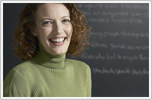 Teacher in front of blackboard