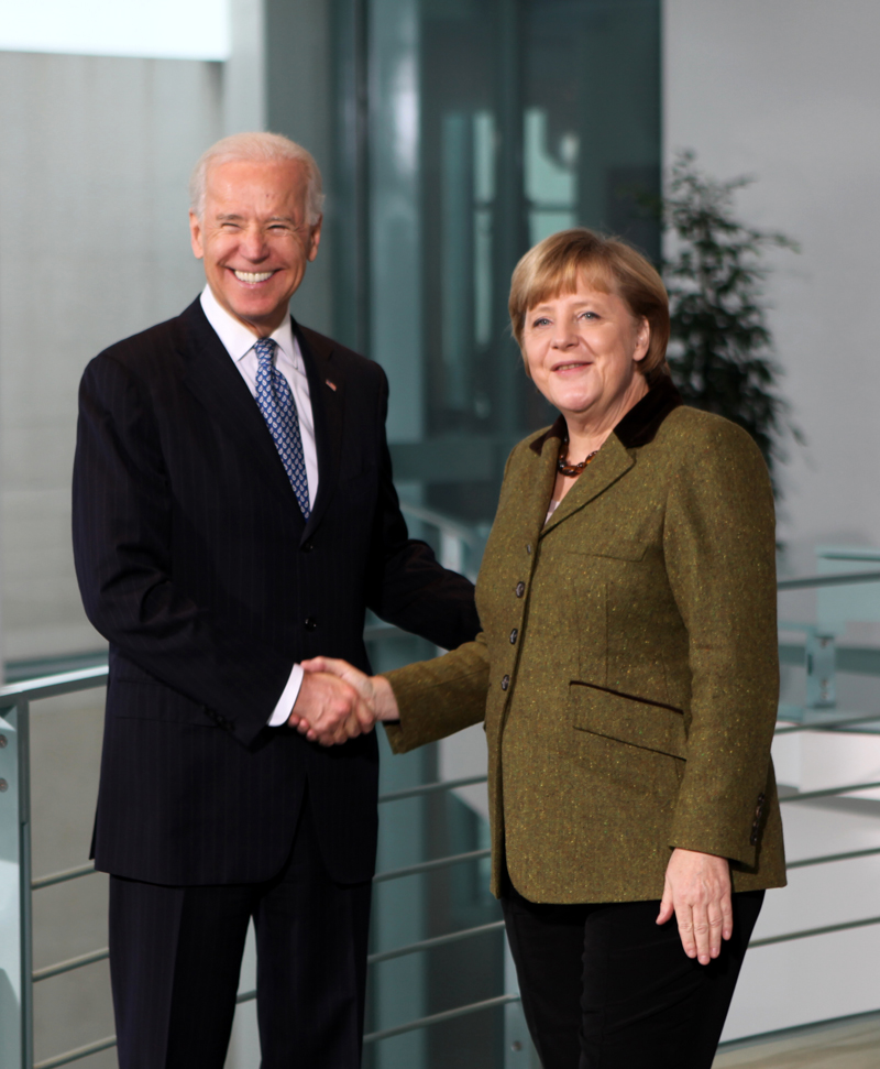 Vice President Biden is greeted by German Chancellor Merkel