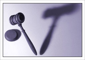 Courtroom gavel on purple background