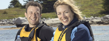 Photo: Man and woman kayaking