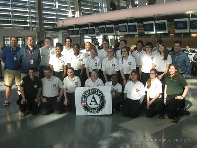 AmeriCorps members prepare to board planes from Sacramento, CA, to New Jersey and New York, where they help will rebuild homes and operate volunteer centers.