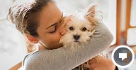 Image: Woman hugging dog (© Gary S. Chapman/Getty Images)