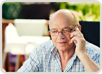 senior man talking on a telephone