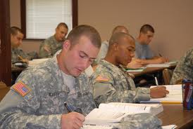 Image of Soldier studying at a desk and the organizational chart for the Army National Guard's Distributed Training Branch
