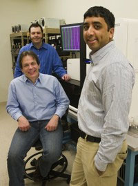 Clare McLean
Brian O'Roak, Evan Eichler (seated)
and Jay Shedure (right) in one of the
UW labs where researchers searched
for sporadic mutations associated
with autism
