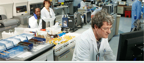 Medical professionals working in a laboratory setting.