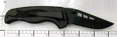 Folding plastic knife discovered at Salt Lake City.