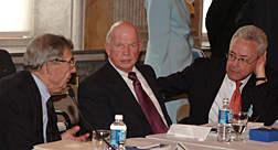 Dr. J. Robert Beyster (left), Chairman and Chief Executive Officer (CEO) of Science Applications International Corporation (SAIC); Donald J. Obert (center), Group Executive, Network Computing for Bank of America; and Daniel P. Burnham, Chairman and CEO of Raytheon Company, discuss agenda items