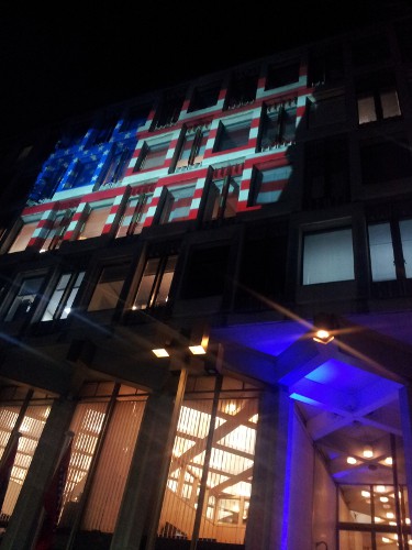 For the 2012 party the U.S. Embassy exterier features the stars and stripes projected onto the facade! (Embassy photo)