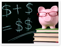 This is an image of a piggy bank on top of text books next to a blackboard.