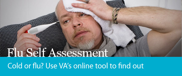 Flu self assessment. Cold or flu? Use VA's online tool to find out. Image of man looking at thermometer and holding a towel to his head