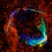 This image combines data from four different space telescopes to create a multi-wavelength view of all that remains of the oldest documented example of a supernova, called RCW 86.