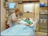 Travel Nurse caring for a patient