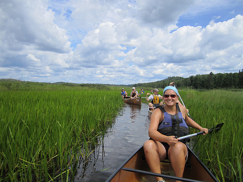 Wilderness Inquiry staff member Emily Walz leads a group in the Boundary Waters Canoe Area on the Superior National Forest, Minnesota