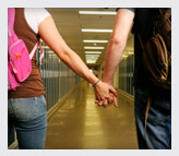 Teens holding hands