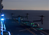 Two MV-22B Ospreys assigned Marine Medium Tiltrotor Squadron (VMM) 266 (Reinforced), prepare to takeoff from the flight deck of the USS Kearsarge (LHD 3), Jan. 27, 2013. The 26th Marine Expeditionary Unit (MEU) and Amphibious Squadron (PHIBRON) 4 are conducting PHIBRON-MEU Integration in preparation for their Composite Training Unit Exercise, the final phase of a six-month pre-deployment training program. The 26th MEU operates continuously across the globe, providing the president and unified combatant commanders with a forward-deployed, sea-based quick reaction force. The MEU is a Marine Air-Ground Task Force capable of conducting amphibious operations, crisis response and limited contingency operations. (U.S. Marine Corps photo by Cpl. Christopher Q. Stone/Released)