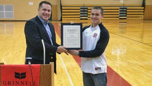 Bruce Congratulates Jack Taylor of Grinnell College feature image