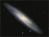 Galaxy NGC 253 as viewed from visible to infrared light.