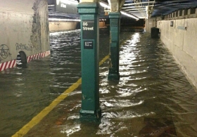 Photograph of 86th Street subway station partially submerged after Sandy