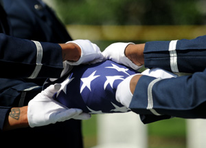 Flag being folded in military burial