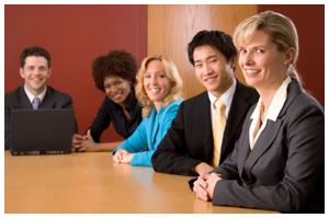 HR Practitioners sitting in meeting around table