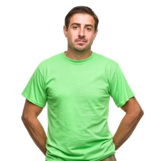 Sad young man wearing T-shirt and cargo pants