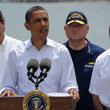 President Obama at podium with Admiral Allen