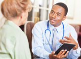 Doctor talks to patient