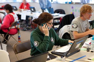 AmeriCorps NCCC members answering phones at Red Cross NJ headquarters in North Brunswick Township, NJ. Corporation for National and Community Service Photo.