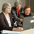 three women at computer