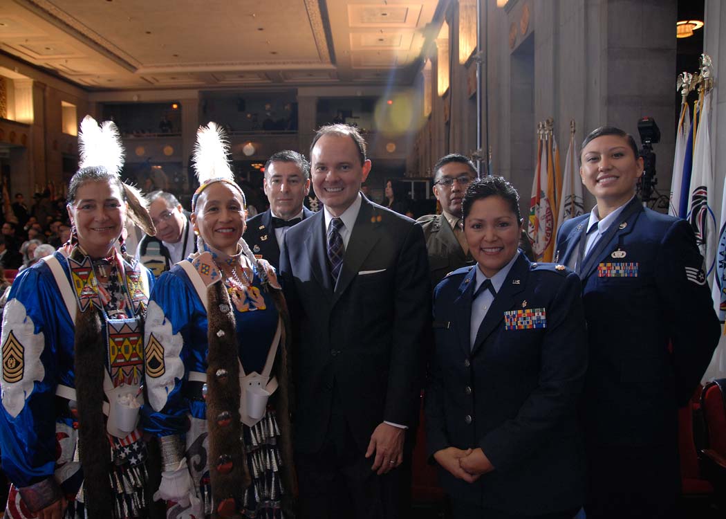 ASIA Washburn, photograph with flag bearers before whitehouse tribal nations conference
