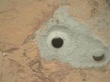 read the article 'NASA Curiosity Rover Collects First Martian Bedrock Sample'