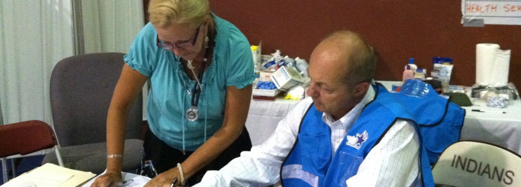 MRC volunteers reviewing supply lists 