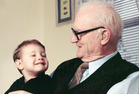Older man with grandson. - Click to enlarge in new window.