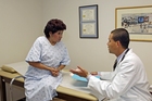 Doctor talking to a patient - Click to enlarge in new window.