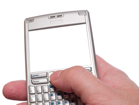 Man holding a blackberry phone