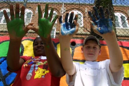 youth with paint on their hands