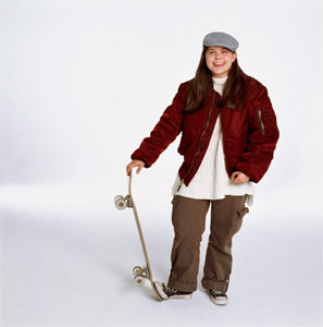 Girl holding skateboard