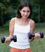 Girl holding two barbells