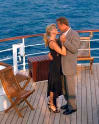 Photo: Man and Women dancing on deck of ship