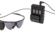 This undated product image provided by Second Sight Medical Products shows a  small video camera and transmitter mounted on a pair of glasses. Images from the camera are processed into electronic data that is wirelessly transmitted to electrodes implanted