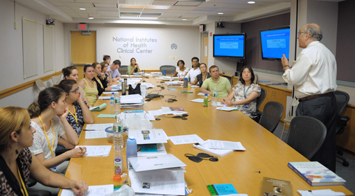 Dr. Juan Lertora speaking to a group of Ph.D. students