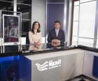 Alhurraâ��s anchors Samar Haddad and Mohsine Jbabdi on the set during Alhurraâ��s live continuous coverage of the protests across the Middle East and North Africa.