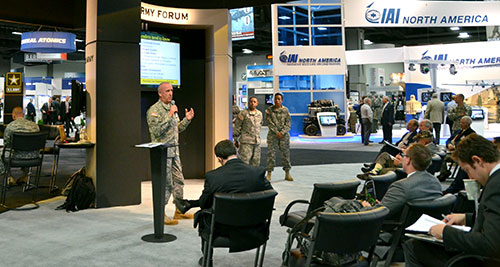 Photo of Command Sgt. Maj. Roger P. Blackwood speaking at the Army forum during the AUSA Annual Meeting and Exposition.