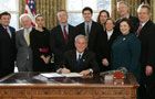 Date: 12/23/2008 Description: President Bush signed the William Wilberforce Trafficking Victims Protection Reauthorization Act of 2008 on December 23, 2008, surrounded by executive branch officials, Congressmen, and NGO advocates in the fight against Modern Day Slavery. © White House Photo